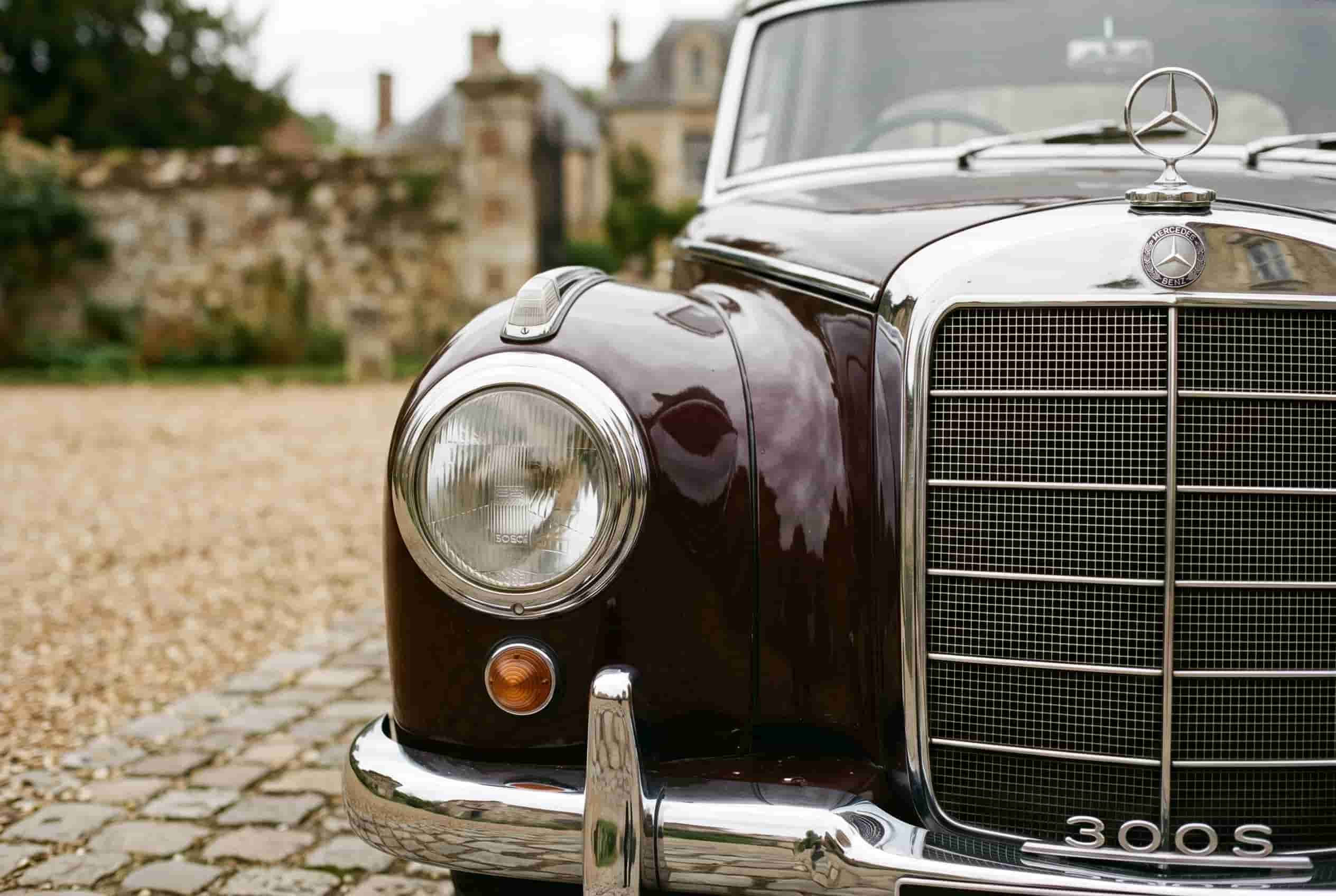 The geometry of understatement – Mercedes 300S grille Close detail of 1950s Mercedes-Benz 300S grille and headlamp with modest chrome and small hood star